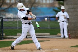 UWO first baseman No. 20 Andy Brahier bats against Ripon College on Tuesday, April 19 at Tiedemann Field.