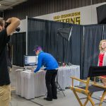 "UWO student Mathew Schulz takes professional headshots for students at the Career Fair on Tuesday Sept. 29 at Kolf Sports Center. "