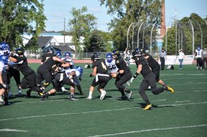  Quarterback Brett Kasper (12) went 22-29 for 350 yards in UWO’s 69-14 victory over UW-Stout on Oct. 3. Kasper has a completion percentage of 65.7 during the 2015 season.
