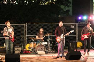 Tim Schneiger and the Middle Men entertain UW Oshkosh students in front of the Horizon Ampitheatre for local live music night.