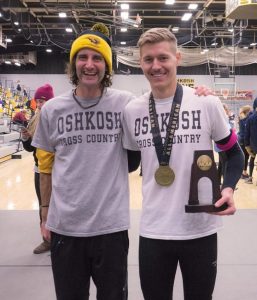Runner Jordan Carpenter, right, poses with head coach Eamon McKenna after winning the 2015 All-American.