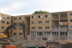 Heavy construction equipment continues to demolish parts of Fletcher Hall’s structure and won’t be finished until Fall 2017.