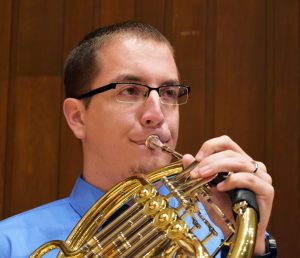 UW Oshkosh student and recipeint of the Barry Tuckwell Scholarship Alex Witt plays the French horn.