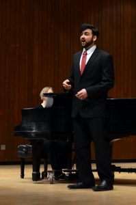 Eli Baumann sings at his senior student recital. He was accompanied by Kristin Ihde on the piano and performed three different sets that featured Mozart.