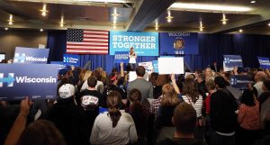 The crowd cheers on Chelsea Clinton as she speaks on behalf of her mother, Hillary, in preparation for the election. Clinton stopped at UWO to encourage early voting as part of her tour through Wisconsin.