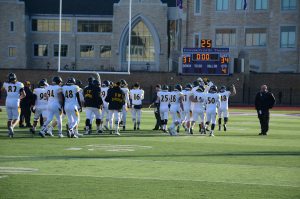 The Titans walk off the field after the victory against St. Thomas. UWO defeated St. Thomas 34-31 in the quarterfinal game and advance to play JCU. 