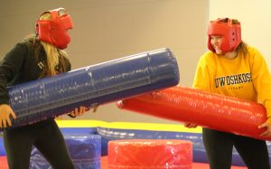 Morgan Price prepares for a battle against her opponent in the jousting arena.
