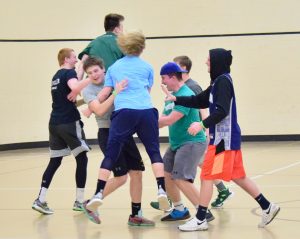 The “Ball Boys” celebrate their dodgeball tournament win. The team reigned supreme and took home championship T-shirts.