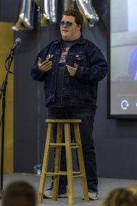 Kellan Henning tells the crowd what UW Oshkosh means to him during his introduction at Mr. UWO.