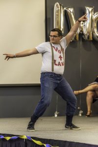 Lane Wohlrab performs an improvised dance routine as his talent during the Mr. UWO event Monday night.