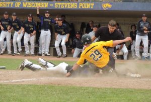 No. 6 junior second baseman Jack Paulson puts the tag on a Stevens Point runner during their four-game series.