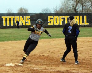 Sophomore Brianna Witter rounds third base and heads home on a double play.