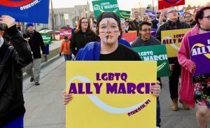 A participant marches proudly for the equal rights for all.