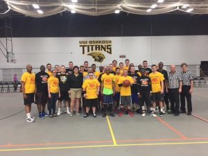 UWO men’s basketball players pose with Special Olympics athletes in Kolf on Sunday.