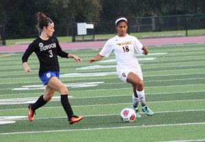 Sophomore forward Madison Smith looks to advance the ball up-field against the University of Dubuque (Iowa) Saturday.