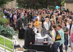 Students attend the annual Taste of Oshkosh event on Sept. 6, which is meant to introduce students to the 138 student organizations, 35 university departments, 1 6 volunteer agencies and 72 community businesses.