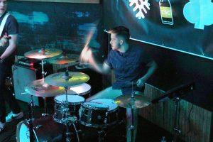 Drummer Lucas Goebel keeps a beat to one of the band’s original songs during the Friday night performance.