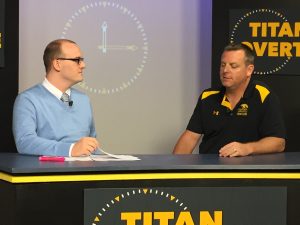 "Titan overtime co-host Nick Bode (left) talks to swim coach Christopher Culp on one of Titan Overtime’s first episodes. Titan OT covers all UWO sports, and offers highlights and interviews with athletes and coaches. "