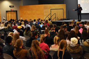 David Zach discusses human trafficking with UW Oshkosh students in Reeve Memorial Union Ballroom Tuesday. Zach described himself as an abolitionist and has written songs about freedom for his band.