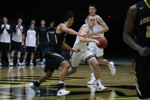 Ben Boots drives past the defense to the basket against Augustana. In the game Saturday, Boots had 23 points on 15 shots. 