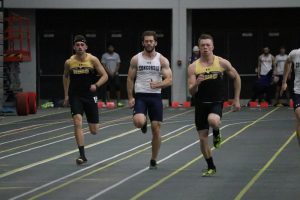 UWO sprinters race against Concordia University of Wisconsin in their first indoor track meet of the season at Kolf. Both the men's and the women's team placed first out of the seven teams that competed on Saturday at UWO.