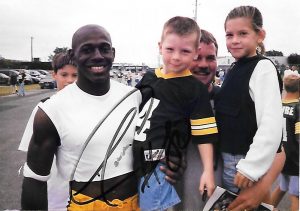 Young brett kasper posing with donald driver