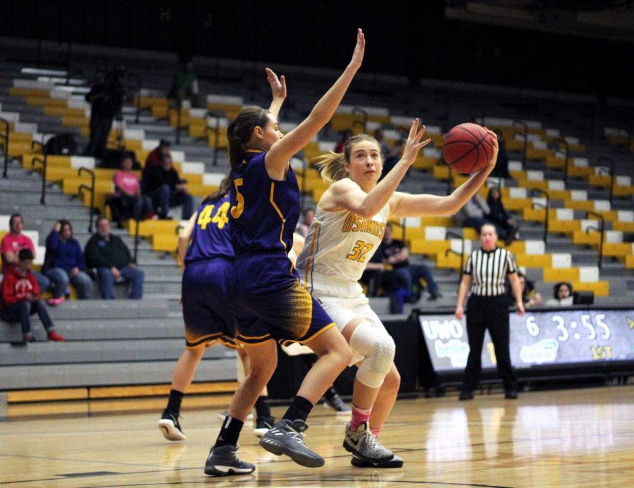 Senior+forward+Madeline+Staples+receives+the+ball+in+the+post+and+works+to+make+a+move+towards+the+basket+against+UW-Stevens+Point+on+Wednesday.+Staples+averages+five+points+per+game+on+42.4+percent+shooting+this+season.