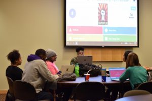 Students participate in trivia games during Black Student Union’s Black History Month trivia night.
