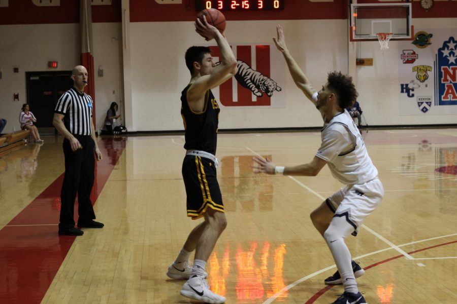 UWO+sophomore+forward+Adam+Fravert+looks+to+move+the+ball+inside+against+Marietta+College+on+Friday%2C+March+2.+In+the+opening+round%2C+Fravert+had+a+14-point%2C+15-rebound+double-double.