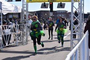 Oshkosh community members participate in the 2018 Spring Shamrock Shuffle and enjoy all of the festivities during the 5k Run/Walk on Saturday.