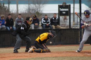 UWO junior catcher Jensen Hinton blocks a pitch in the dirt against UWSP on April 12. On the season, Hinton has a .276 batting average with two home runs and 14 RBIs. 