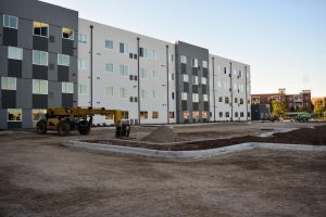 The Annex of Oshkosh apartments undergo construction this past week despite the move-in date being Monday, Sept. 3. The move-in date for students was pushed back due to a failed inspection, resulting in students moving into the Gruenhagen Conference Center until construction finished.