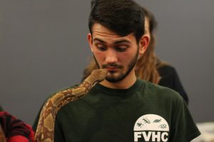 UW Oshkosh students face their fears and tackle the art of snake-handling during Titan Nights in Reeve Memorial Union on Friday, Sept. 7.