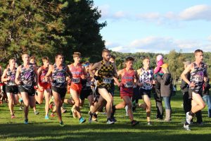 UWO sophomore Aaron Dorsey runs with a pack of competitors at the UW-Eau Claire meet. Dorsey finished in 272 out of 430 runners.