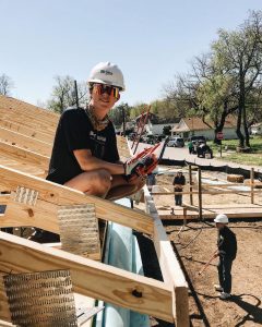 Bike & Build 2018 Trip Leader, Sydney Arvin, works hard volunteering to build homes with Habitat for Humanity in Lexington, Kentucky. 