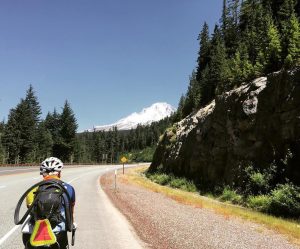 Bike & Build member, Megan Althus travels through the mountains, celebrating Earth Day.