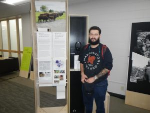 UWO student and Oneida Nation member Nick Metoxen shows off his display.