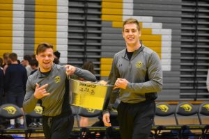 Titan senior wrestler Mark Choiski and junior Colten Cashmore pose with the Chanchellor’s Cup. 