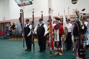 Native American veterans begin the grand march.