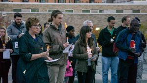 UWO students and community members honor the victims by joining together for a candlelight vigil.