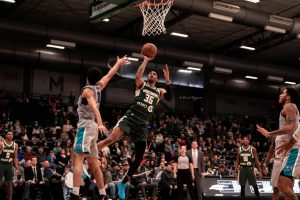 Christian Wood opts for a floater over a Greensboro Swarm player in the Herd’s 105-107 loss at Menomonee Nation Arena. Wood finished with 19 points. 