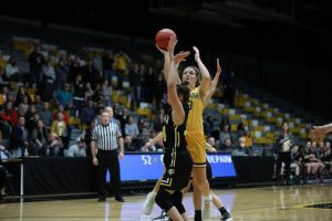 UWO Sophomore Nikki Arneson scores the game-winning basket with 1.3 seconds remaining in the game.