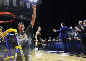 UWO seniors Brett Wittchow and Ben Boots celebrate the final stage of their championship run. They led the team to the first championship in program history.