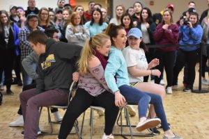 Students particpate in musical chairs during the 2019 Winter Carnival, aimed to engage students.