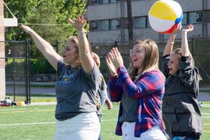 Mariah Heyden, Hannah Brown and Nikki Mohrmann celebrate sorority bid day last fall.