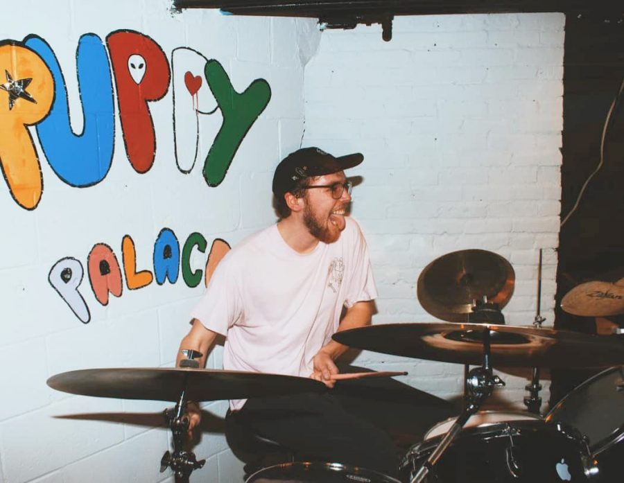 Nosebleeds drummer Paul St. Aubin plays at The Puppy Palace under its freshly painted backdrop. Nosebleeds are one of the original bands to play at The Puppy Palace and have their debut album Good Boy available on all streaming services.