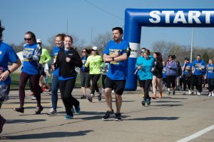 unners participate in mental health awareness run