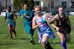 UWO Womens Rugby hosts promball, players play in dresses of all styles.