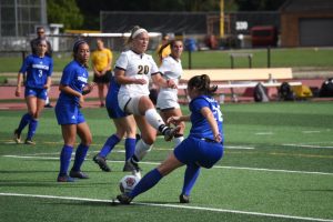 Junior Emily Burg from Larsen, Wisconsin, scored the first goal for the Titans in the 16th minute of the opening home game win against the Stars. 