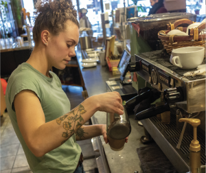 Planet Perk barista works to ensure an order is served to perfection. 